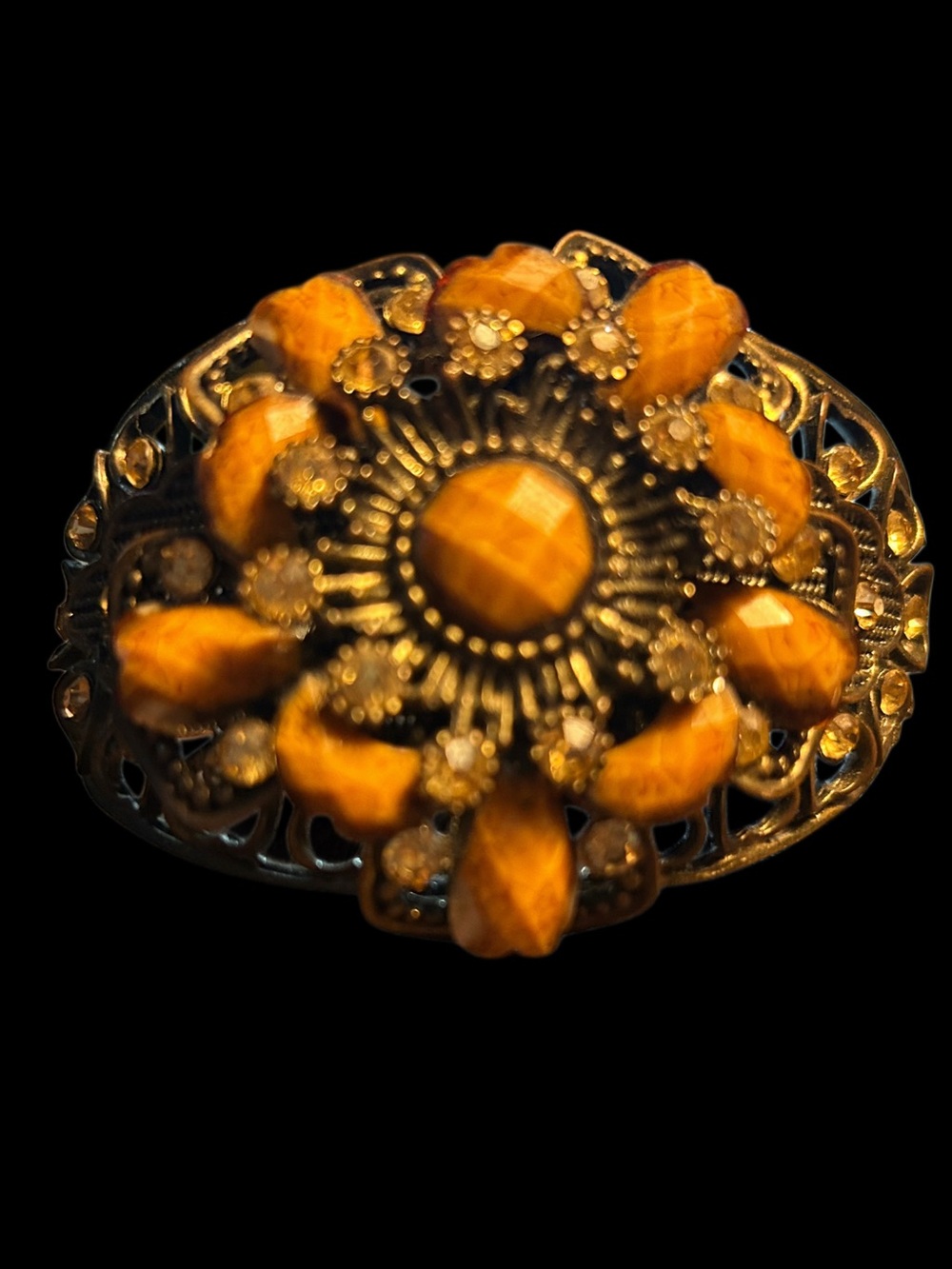 Vintage cuff bracelet w/amber rhinestones & faceted stones in flower motif